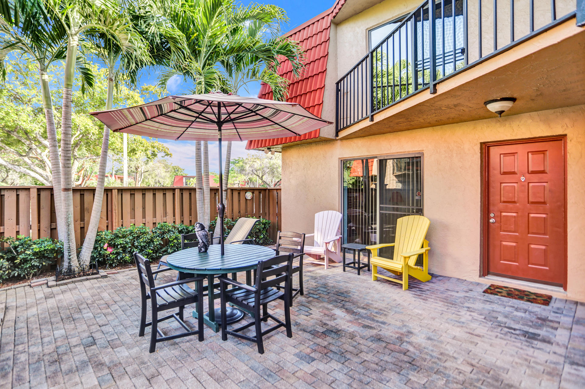 8057 Severn Drive, Unit A Boca Raton, FL 33433 - Photo 25 of 33 a view of a table and chairs in patio