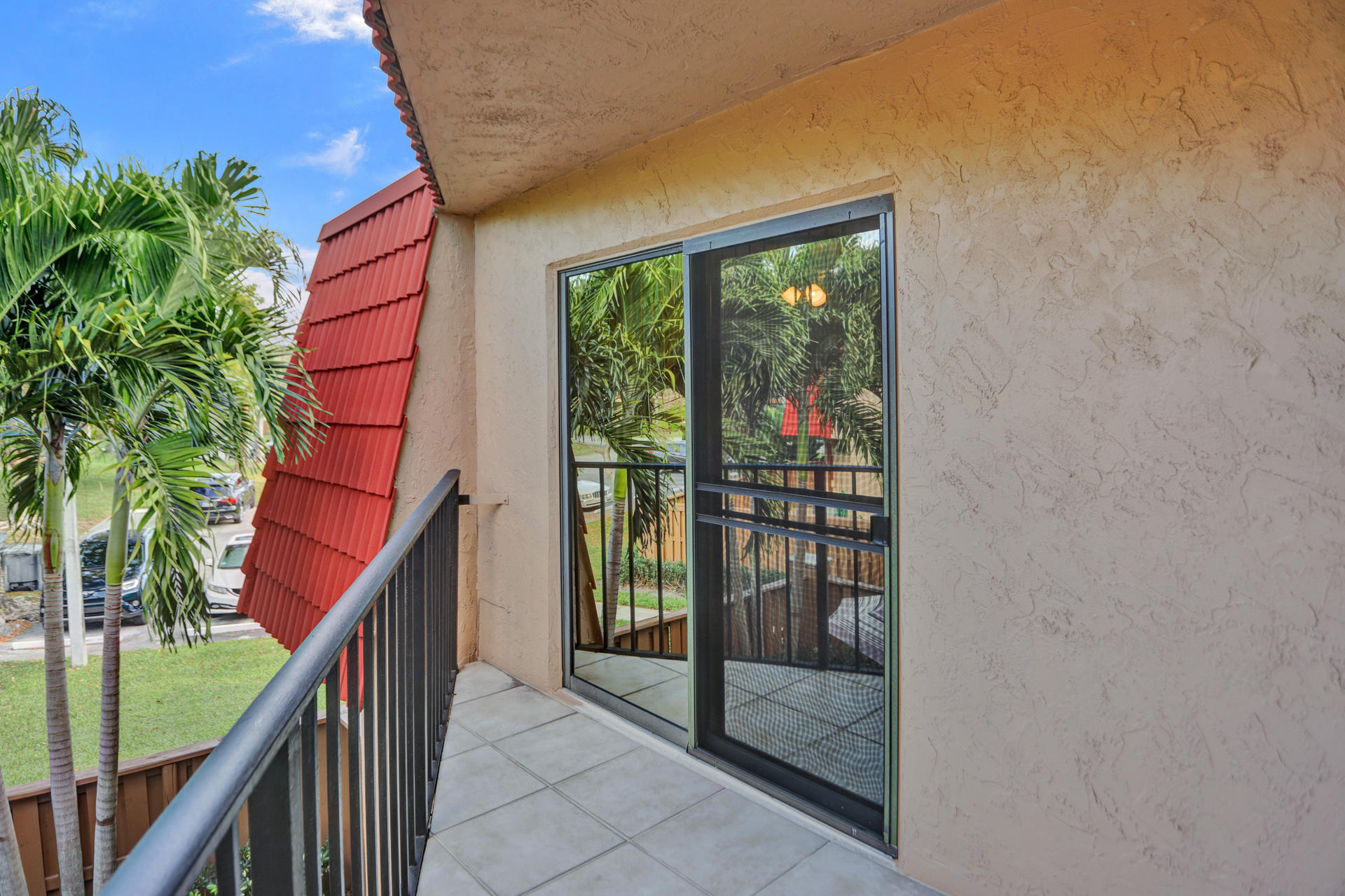 8057 Severn Drive, Unit A Boca Raton, FL 33433 - Photo 27 of 33 a balcony view with a garden