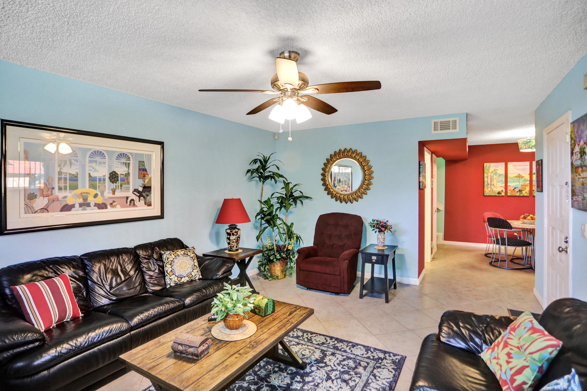 8057 Severn Drive, Unit A Boca Raton, FL 33433 - Photo 3 of 33 a living room with furniture a rug and a window