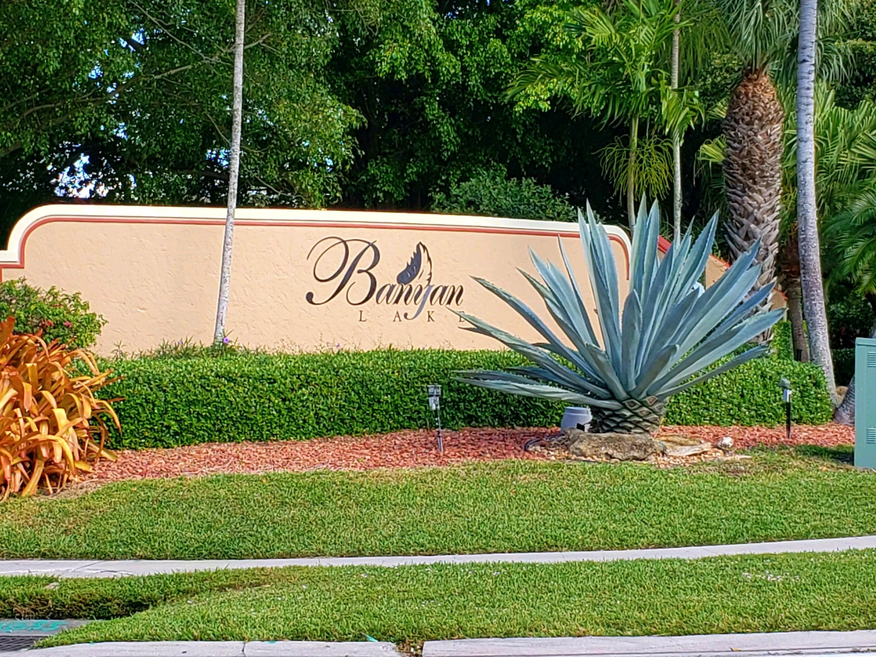 8057 Severn Drive, Unit A Boca Raton, FL 33433 - Photo 33 of 33 a sign that is sitting in front of a tree