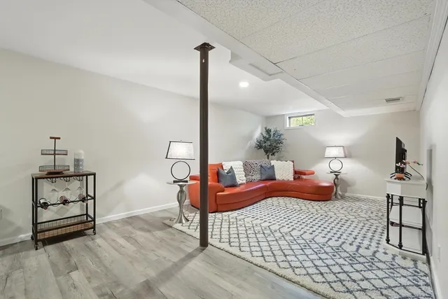 a view of a chair and table on the deck