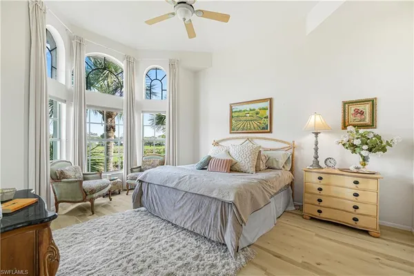 a bedroom with a bed and a couch