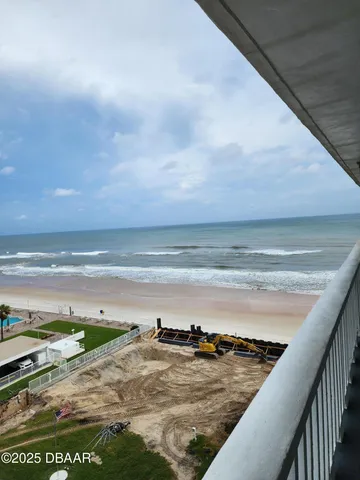 a view of a balcony with an outdoor space