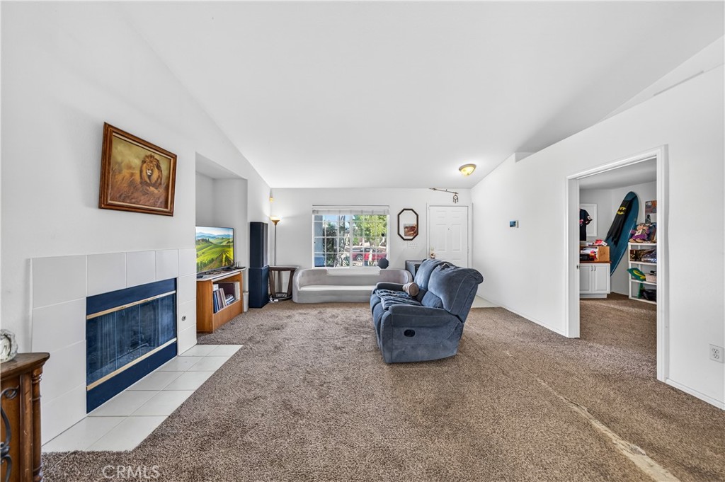 2995 Joshua Way Hemet, CA 92545 - Photo 15 of 34 a living room with furniture and a fireplace