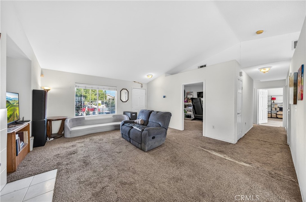 2995 Joshua Way Hemet, CA 92545 - Photo 16 of 34 a living room with furniture and a flat screen tv
