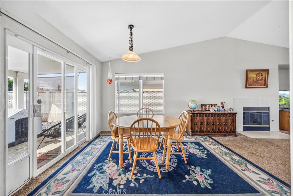 2995 Joshua Way Hemet, CA 92545 - Photo 21 of 34 a view of a dining room with furniture window and wooden floor