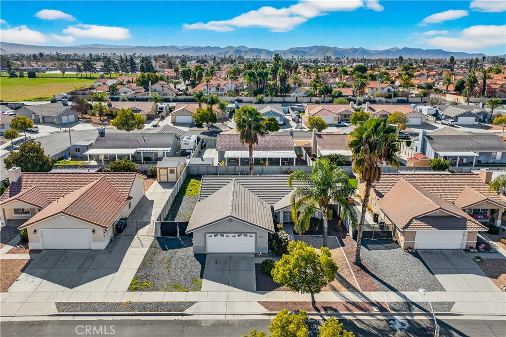 2995 Joshua Way Hemet, CA 92545 - Photo 5 of 34 an aerial view of residential houses with outdoor space