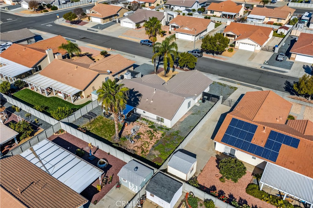 2995 Joshua Way Hemet, CA 92545 - Photo 7 of 34 an aerial view of a residential apartment building with a yard