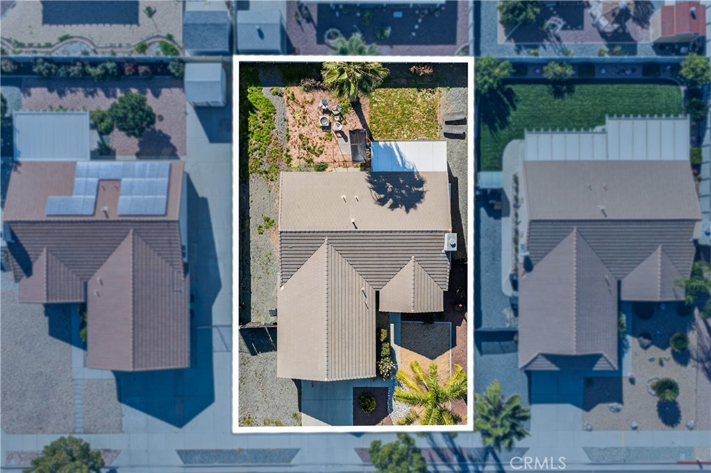 2995 Joshua Way Hemet, CA 92545 - Photo 9 of 34 an aerial view of a house with swimming pool and outdoor seating
