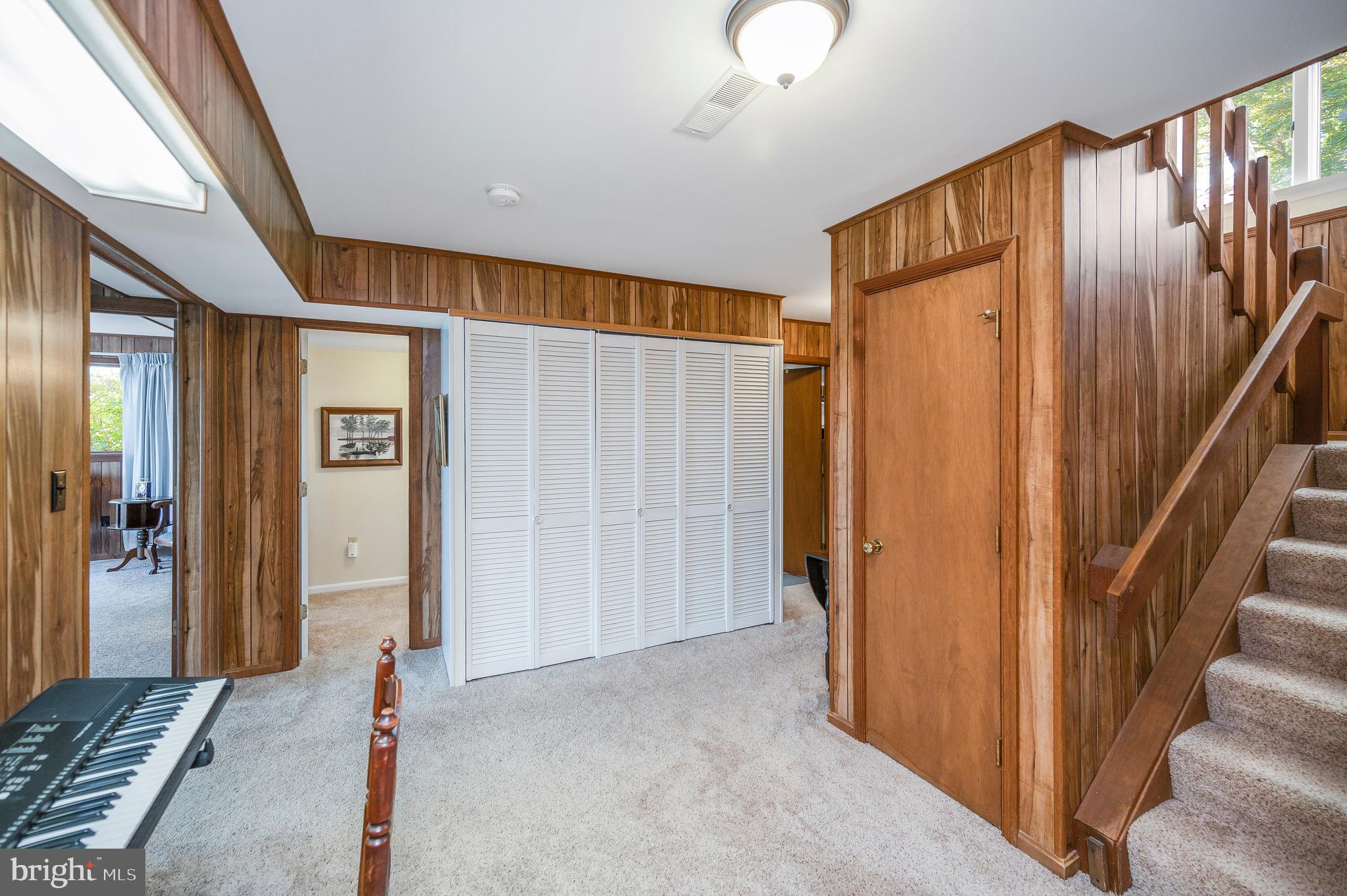 126 Greenspring Road Locust Grove, VA 22508 - Photo 40 of 90 lower foyer storage closets