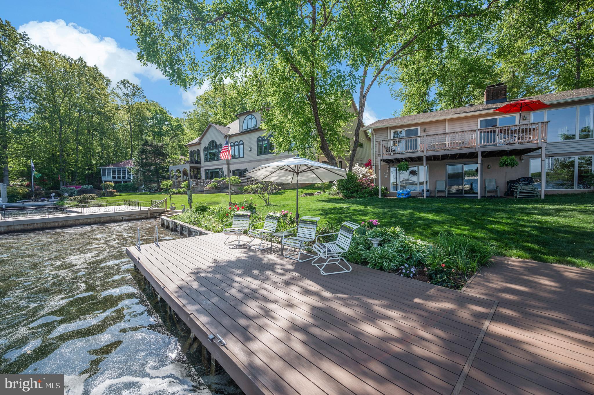 126 Greenspring Road Locust Grove, VA 22508 - Photo 56 of 90 view from dock to lushly landscaped lakeside yard