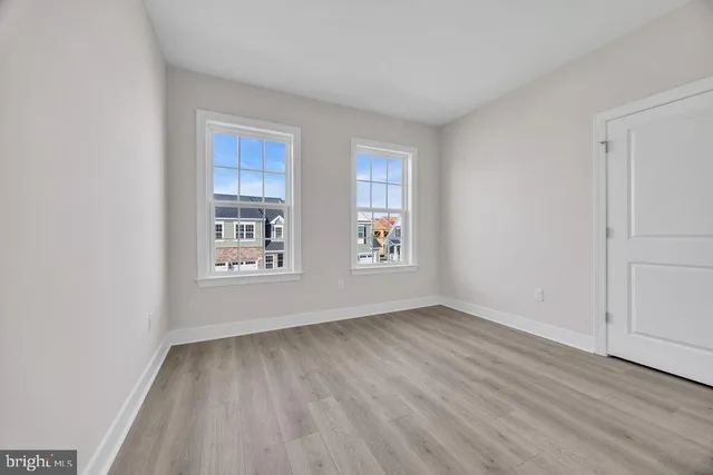 an empty room with windows