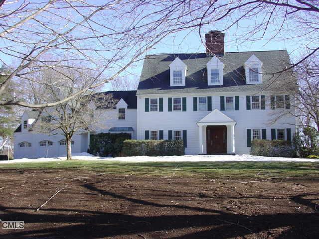 53 Hemmelskamp Road Wilton, CT 06897 - Photo 1 of 1 a front view of residential houses with yard