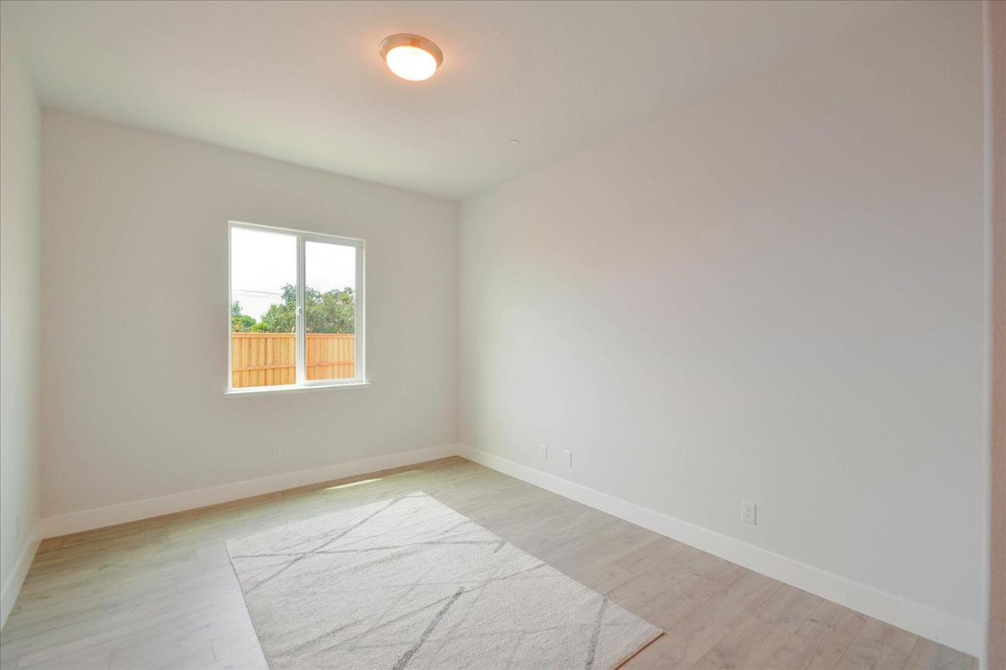 8157 Poppy Ridge Road Elk Grove, CA 95757 - Photo 16 of 42 an empty room with a window