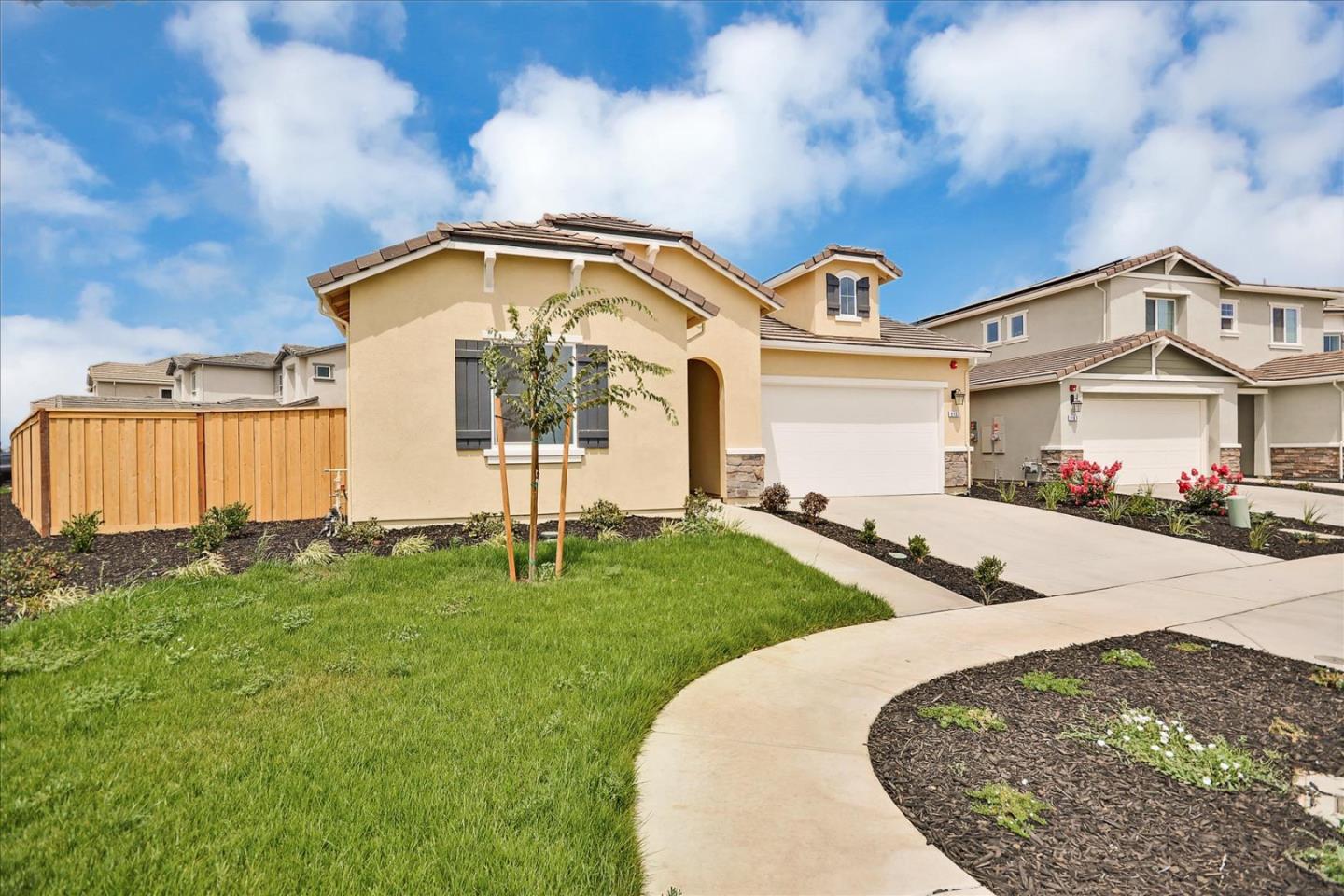 8157 Poppy Ridge Road Elk Grove, CA 95757 - Photo 2 of 42 a view of a house with a backyard