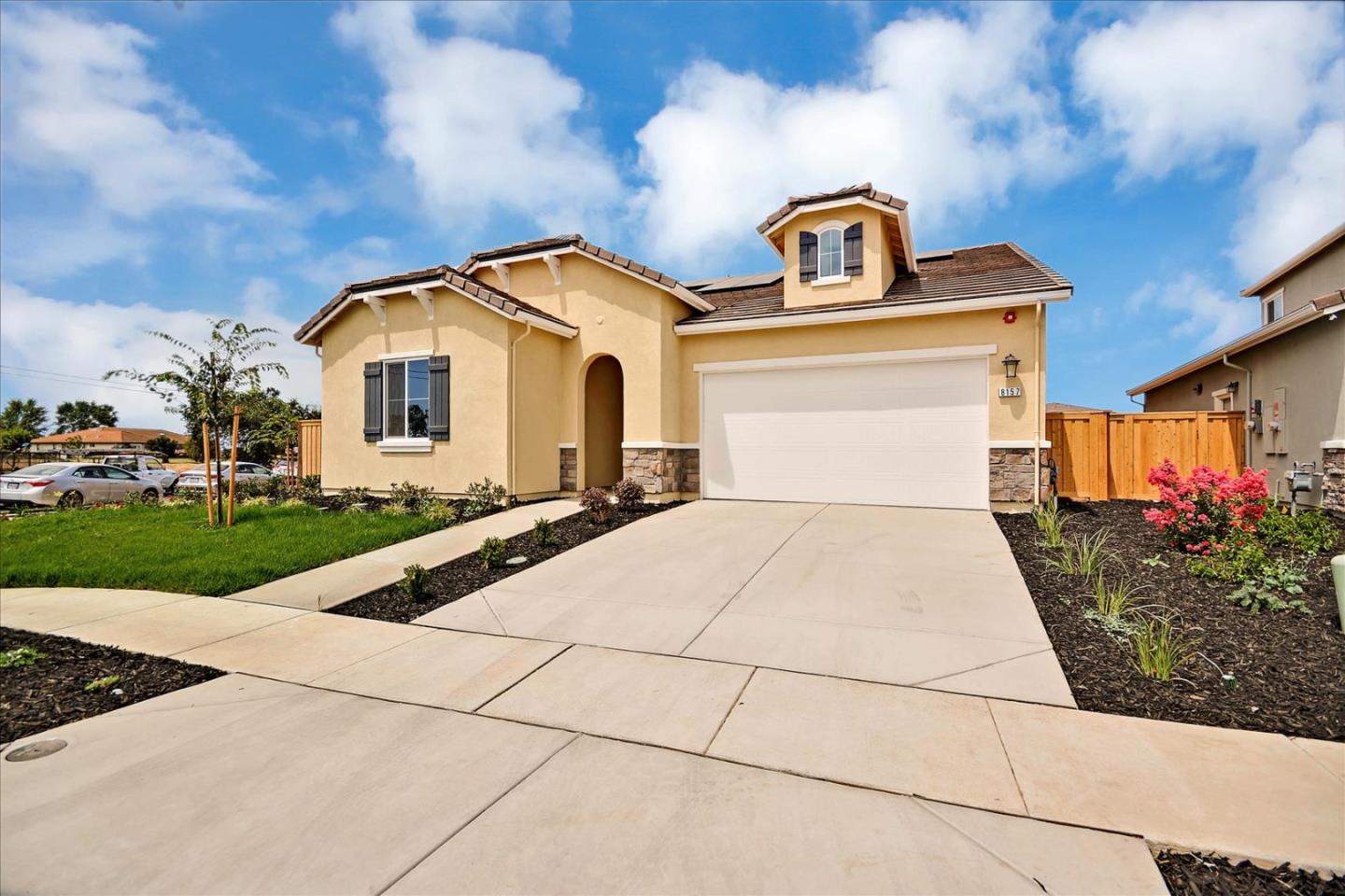 8157 Poppy Ridge Road Elk Grove, CA 95757 - Photo 3 of 42 a front view of a house with yard