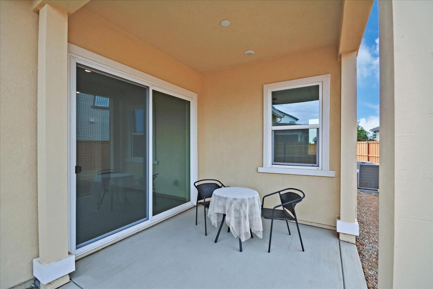 8157 Poppy Ridge Road Elk Grove, CA 95757 - Photo 34 of 42 a view of a livingroom with furniture and front door