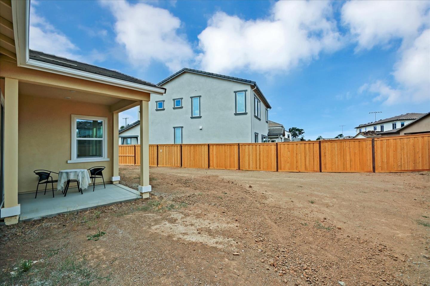 8157 Poppy Ridge Road Elk Grove, CA 95757 - Photo 35 of 42 a view of a house with a backyard