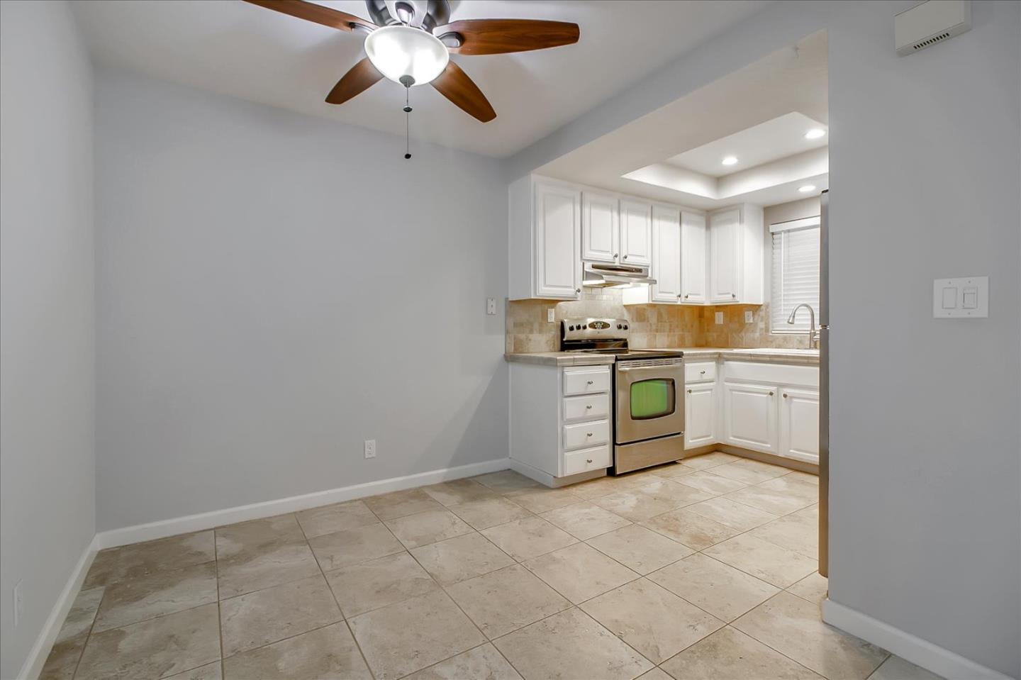 275 Shadow Dance Drive San Jose, CA 95110 - Photo 14 of 31 a kitchen with a cabinets and window