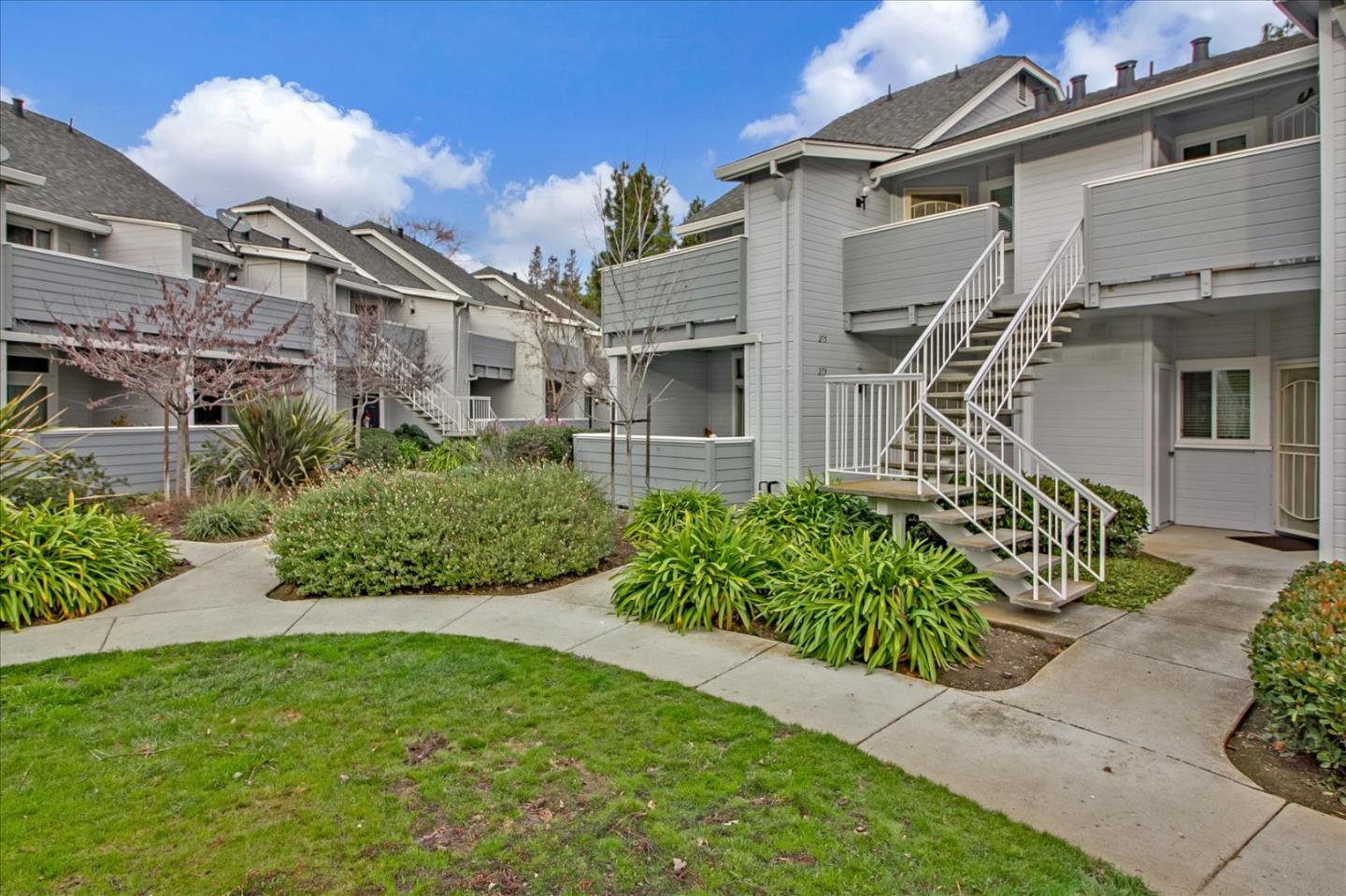 275 Shadow Dance Drive San Jose, CA 95110 - Photo 2 of 31 a front view of a house with a garden