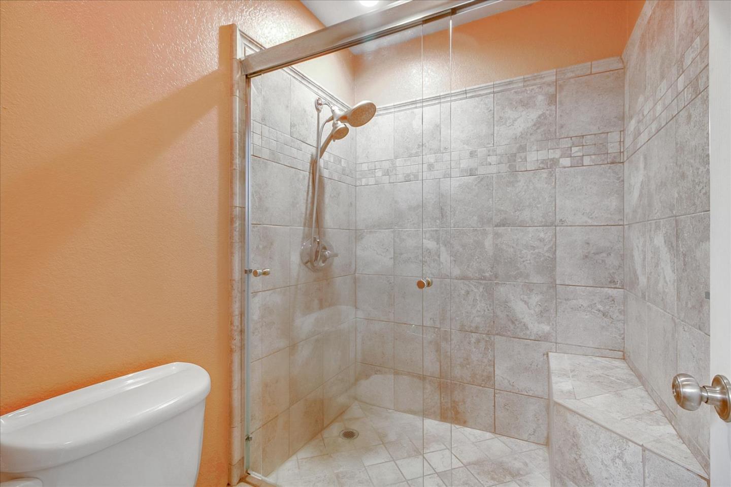275 Shadow Dance Drive San Jose, CA 95110 - Photo 21 of 31 a bathroom with a shower a toilet and a shower