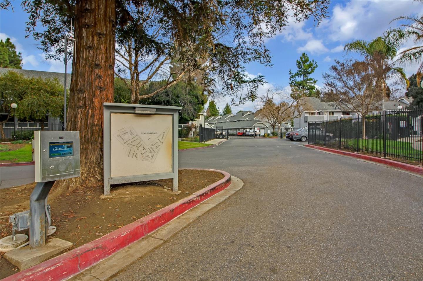 275 Shadow Dance Drive San Jose, CA 95110 - Photo 30 of 31 a front view of a house with a yard