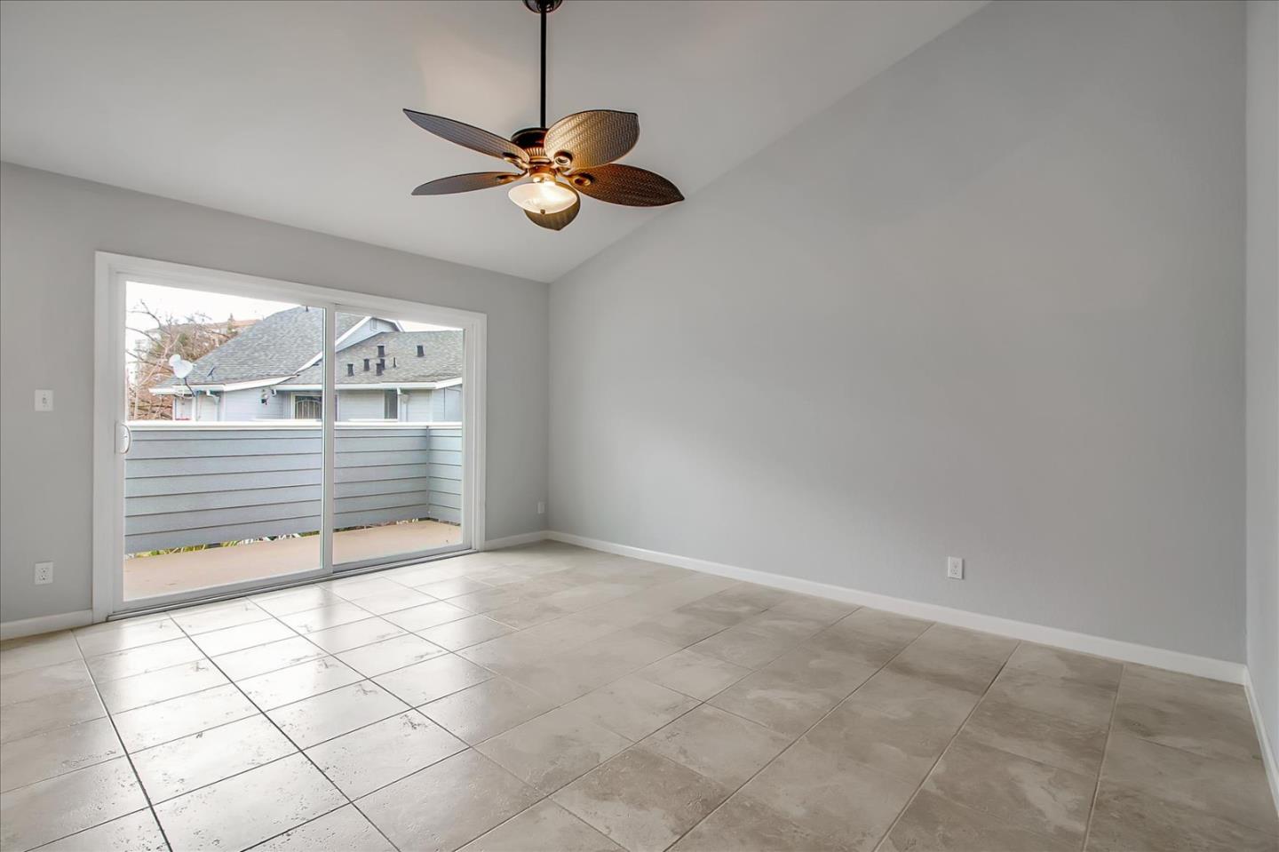 275 Shadow Dance Drive San Jose, CA 95110 - Photo 7 of 31 a view of an empty room with a window