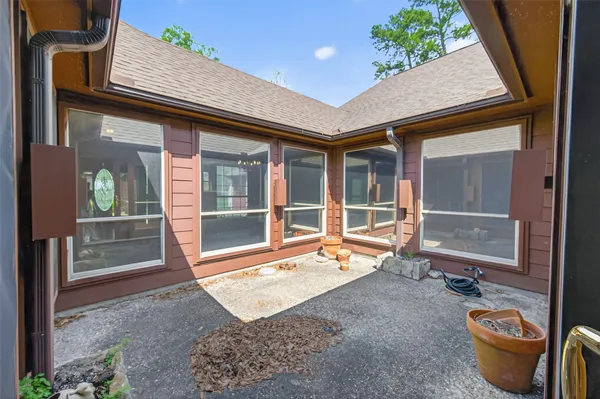 a house view with a outdoor space
