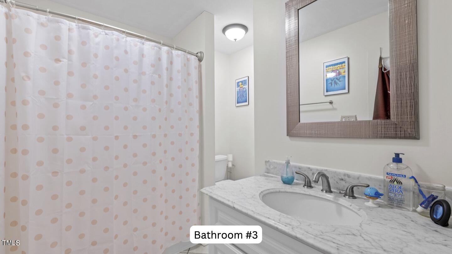 6531 New Market Way Raleigh, NC 27615 - Photo 22 of 27 bathroom