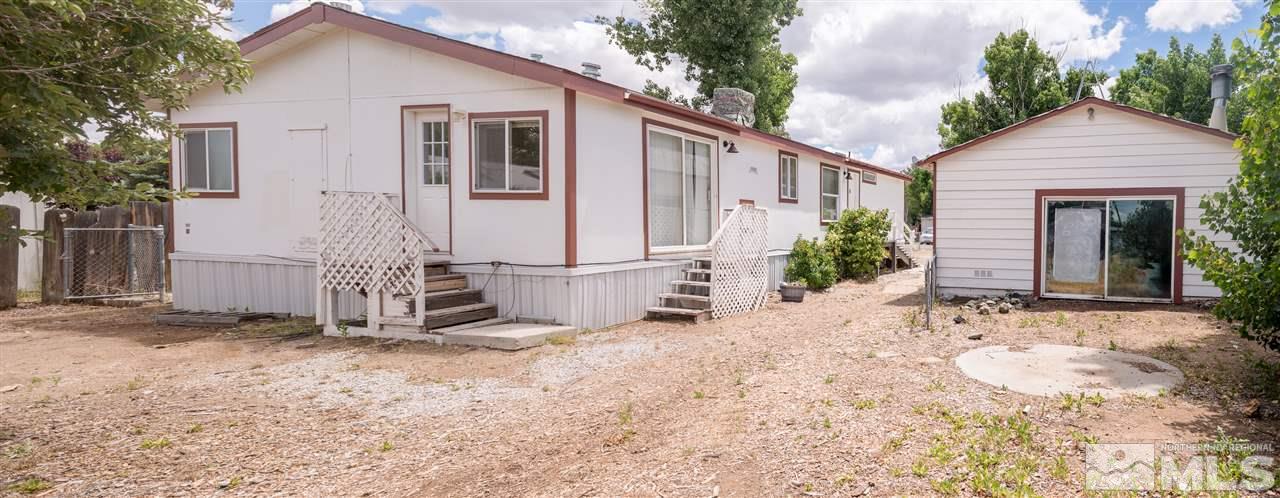355 Magnolia Way Reno, NV 89506 - Photo 20 of 21 a view of a house with backyard and garden