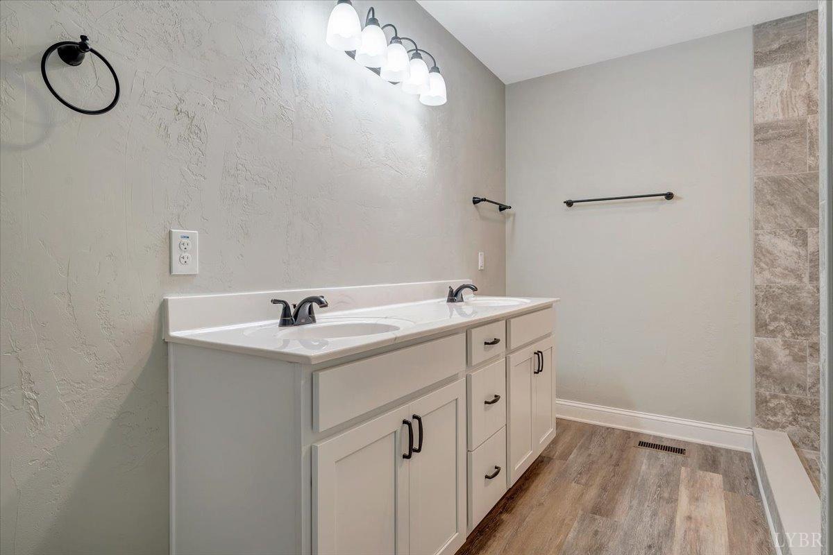 5934 Joppa Mill Road Moneta, VA 24121 - Photo 18 of 45 a utility room with cabinets washer and dryer