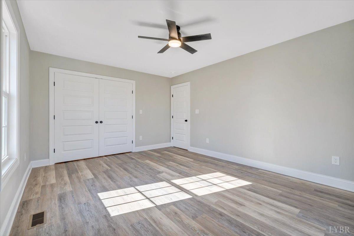 5934 Joppa Mill Road Moneta, VA 24121 - Photo 25 of 45 wooden floor in an empty room