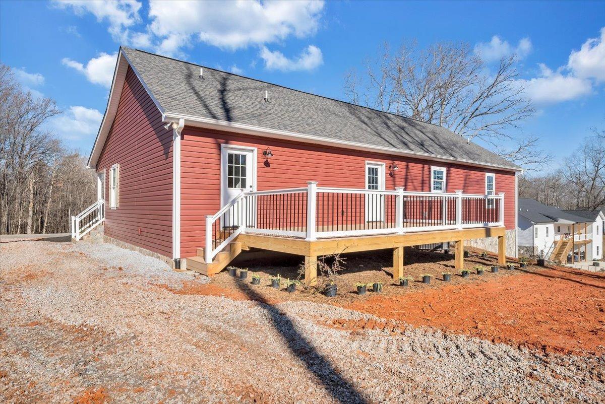 5934 Joppa Mill Road Moneta, VA 24121 - Photo 33 of 45 a front view of a building with a large tree
