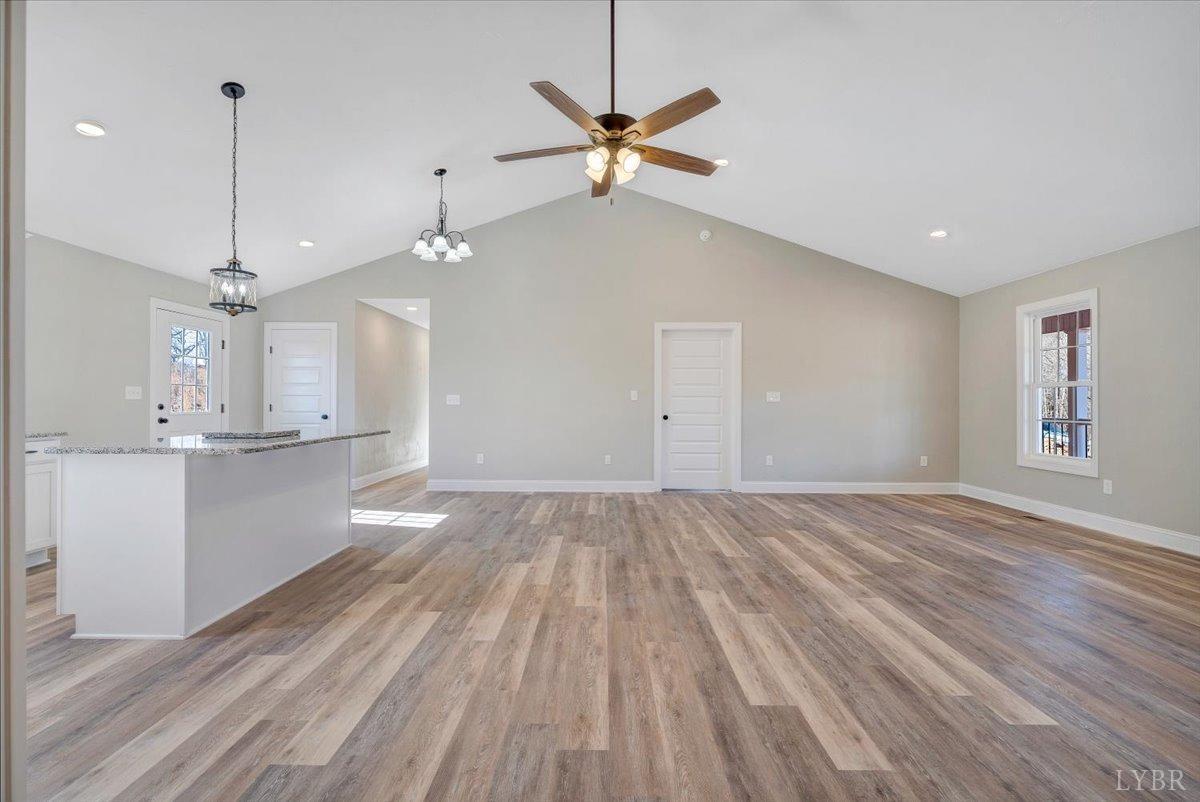 5934 Joppa Mill Road Moneta, VA 24121 - Photo 6 of 45 a view of an empty room with window and wooden floor