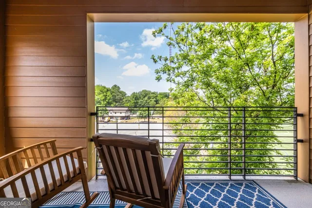 a view of a balcony with lake view