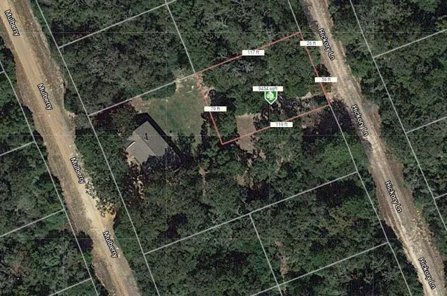 an aerial view of residential house with outdoor space