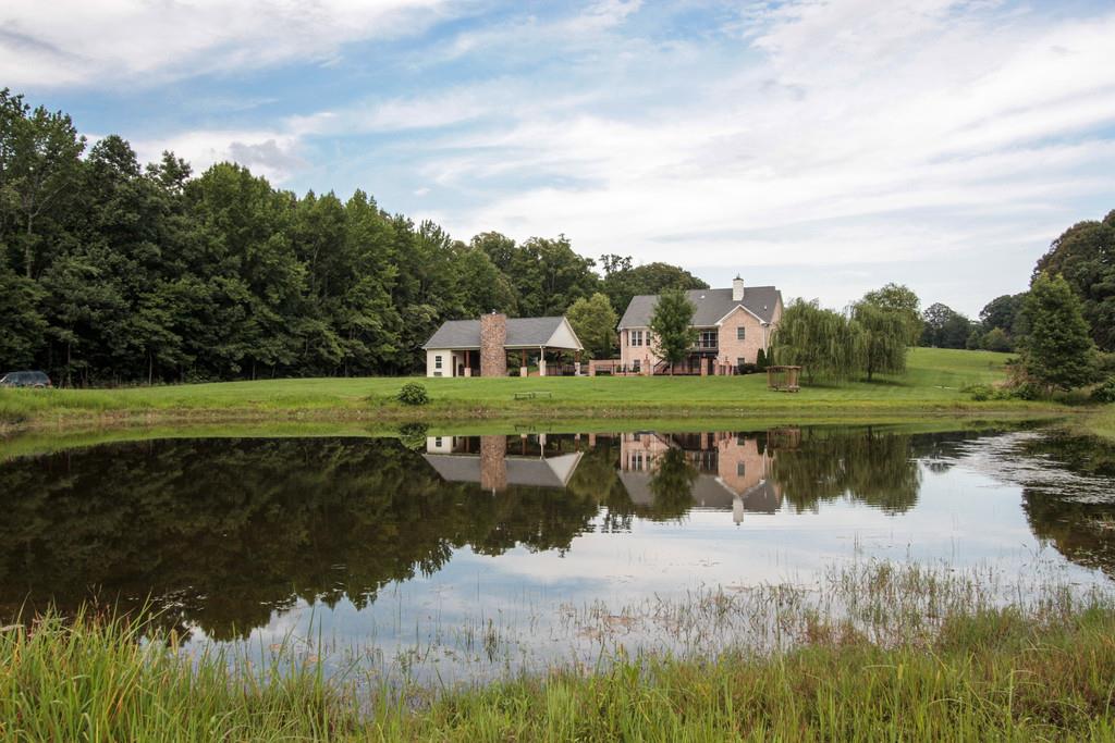 7127 Old Franklin Road Fairview, TN 37062 - Photo 30 of 30 a view of a lake with houses in the back