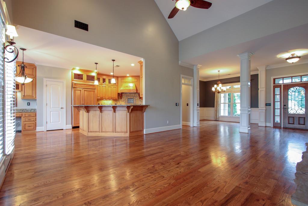 7127 Old Franklin Road Fairview, TN 37062 - Photo 8 of 30 an empty room with wooden floor and windows