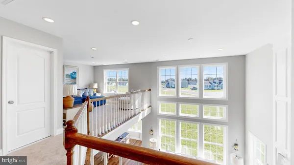 a view of a living room and dining room