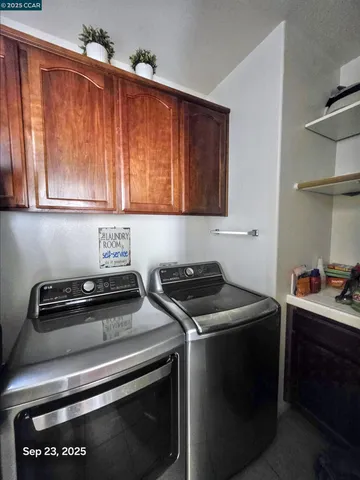 a kitchen with a stove and a microwave