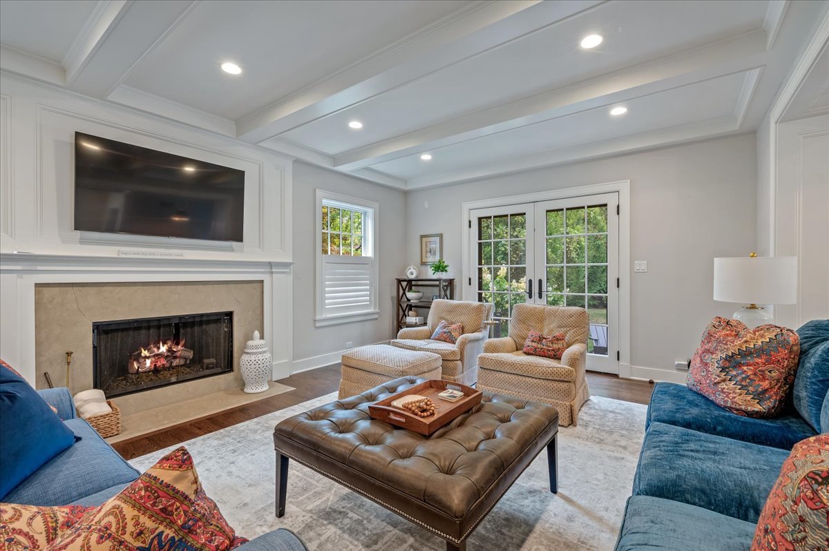 1503 Edgewood Lane Winnetka, IL 60093 - Photo 16 of 46 a living room with furniture and a fireplace