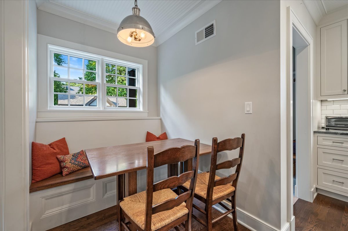 1503 Edgewood Lane Winnetka, IL 60093 - Photo 18 of 46 a view of a dining room with furniture and a chandelier