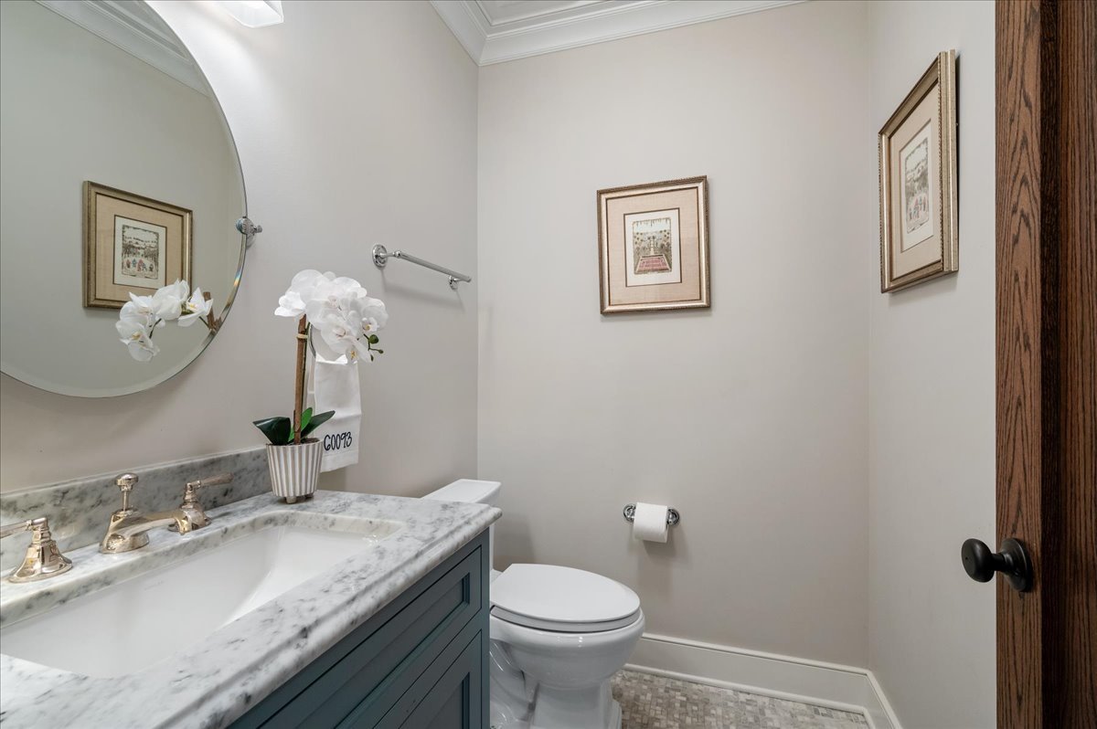 1503 Edgewood Lane Winnetka, IL 60093 - Photo 20 of 46 a bathroom with a granite countertop sink mirror and toilet