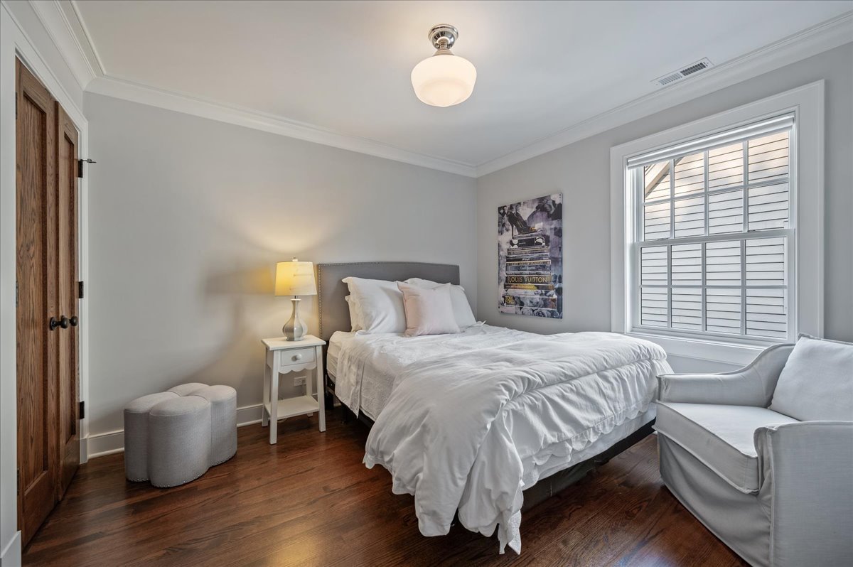 1503 Edgewood Lane Winnetka, IL 60093 - Photo 29 of 46 a bedroom with a large bed and a window