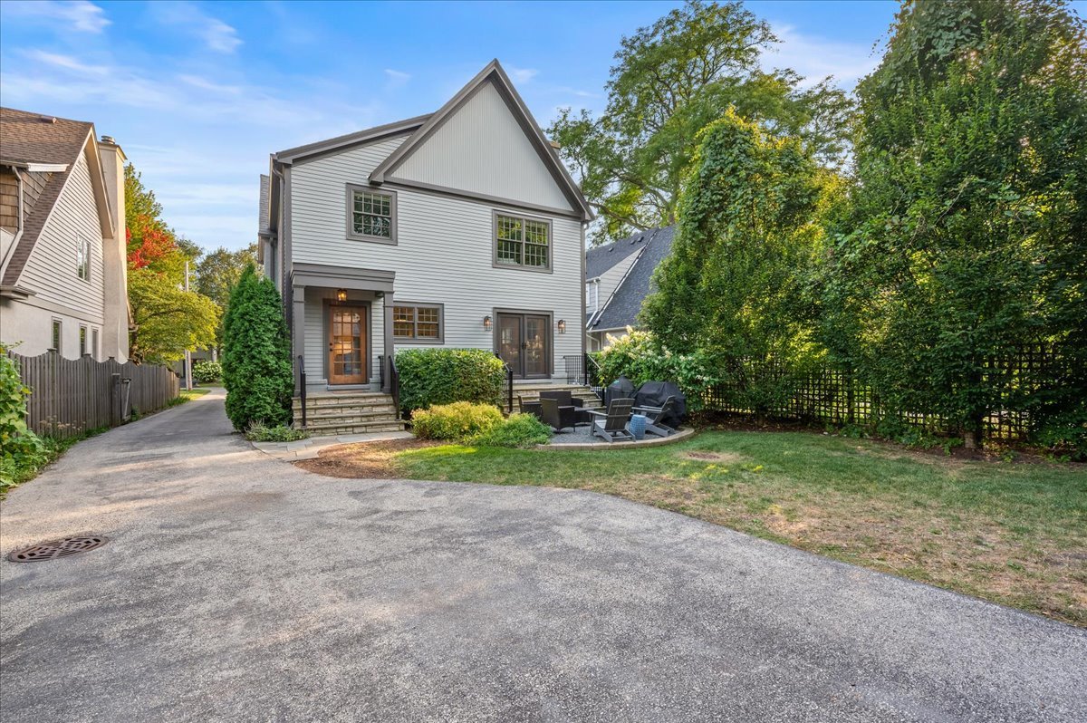 1503 Edgewood Lane Winnetka, IL 60093 - Photo 37 of 46 a view of a house with backyard and trees