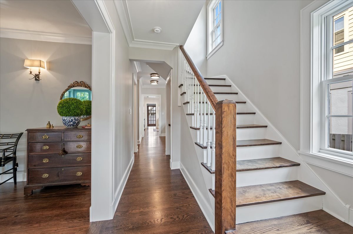 1503 Edgewood Lane Winnetka, IL 60093 - Photo 5 of 46 a view of a hallway with wooden floor and staircase