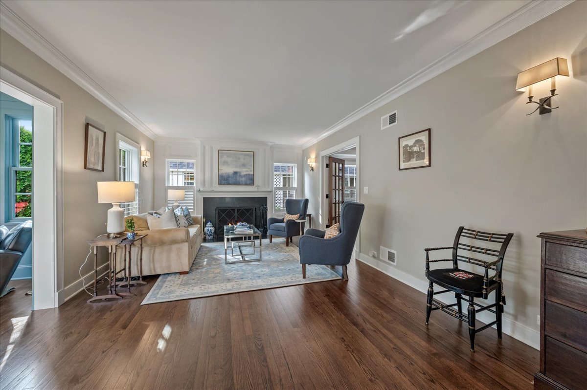 1503 Edgewood Lane Winnetka, IL 60093 - Photo 6 of 46 a living room with furniture a fireplace and a window