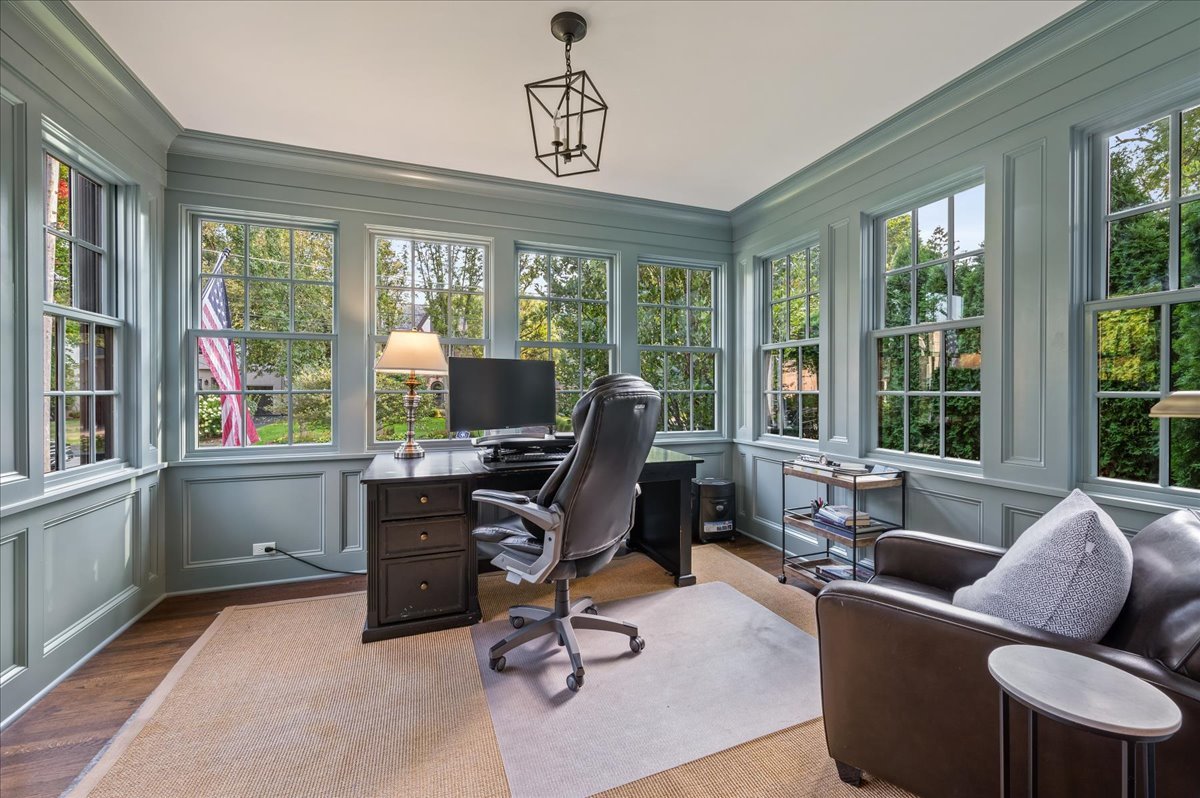 1503 Edgewood Lane Winnetka, IL 60093 - Photo 8 of 46 a view of a livingroom with workspace and windows