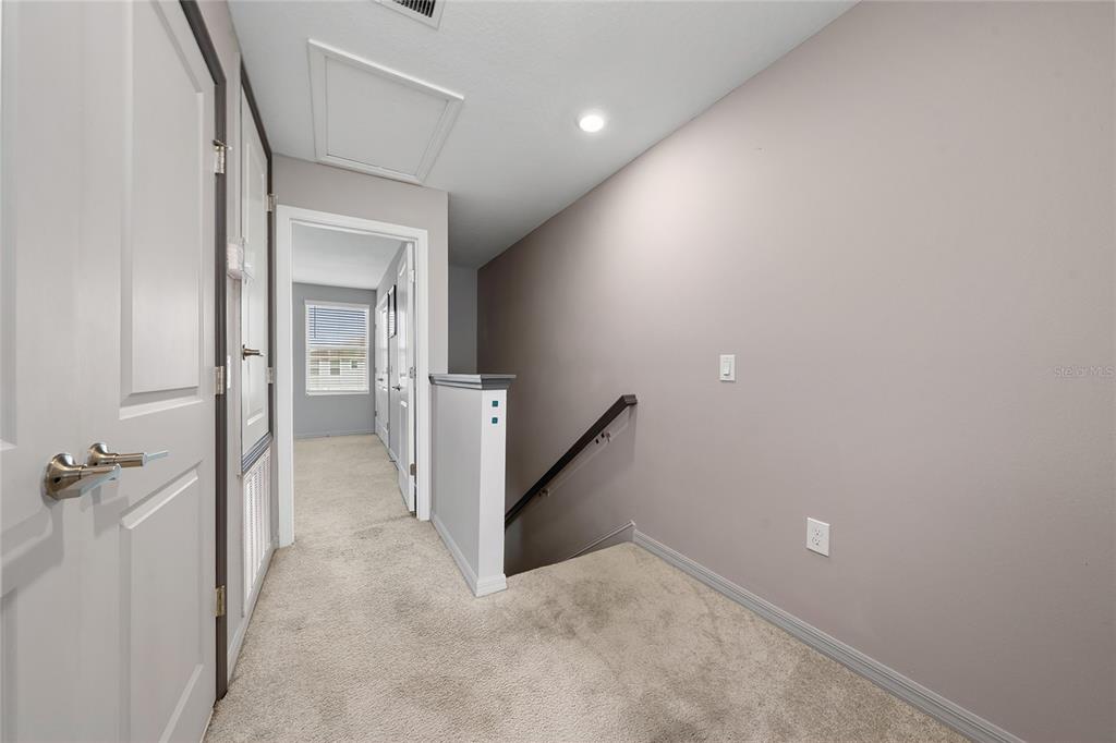 2060 Viewfinder Street Kissimmee, FL 34758 - Photo 11 of 23 a view of a hallway with a room
