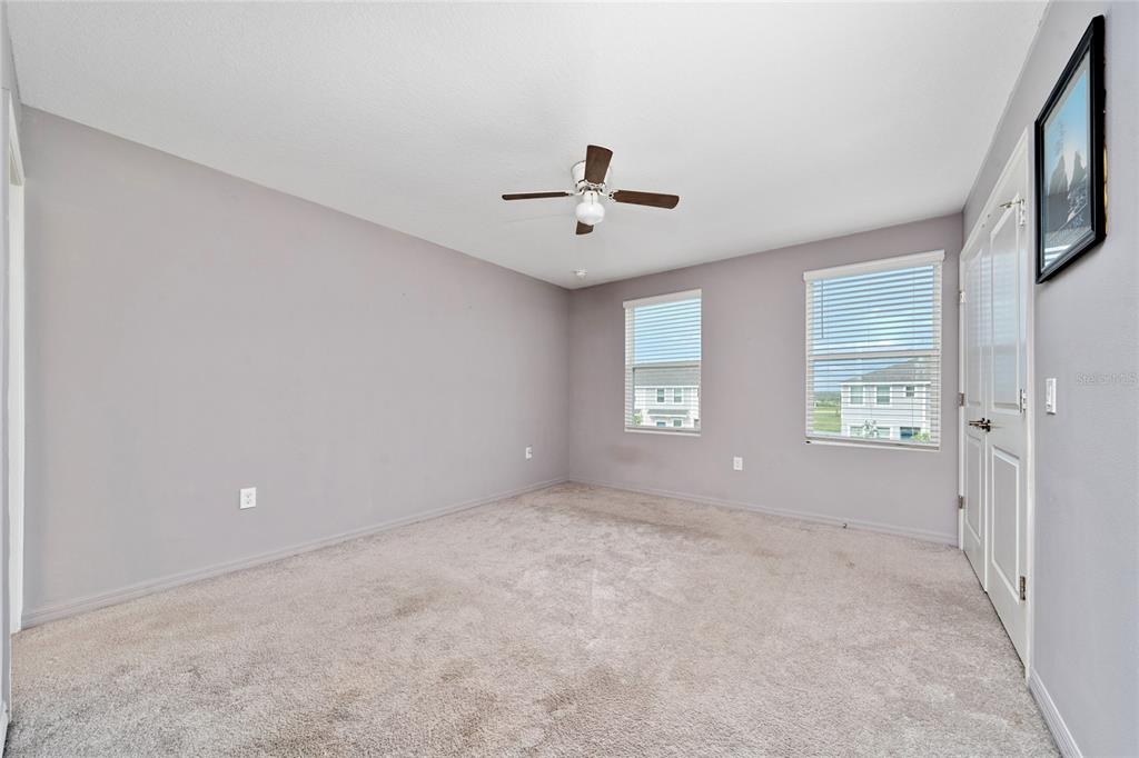 2060 Viewfinder Street Kissimmee, FL 34758 - Photo 15 of 23 a view of an empty room with a window